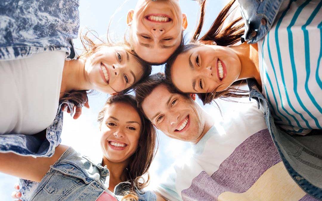 group teenagers smiling invisalign teen boca raton