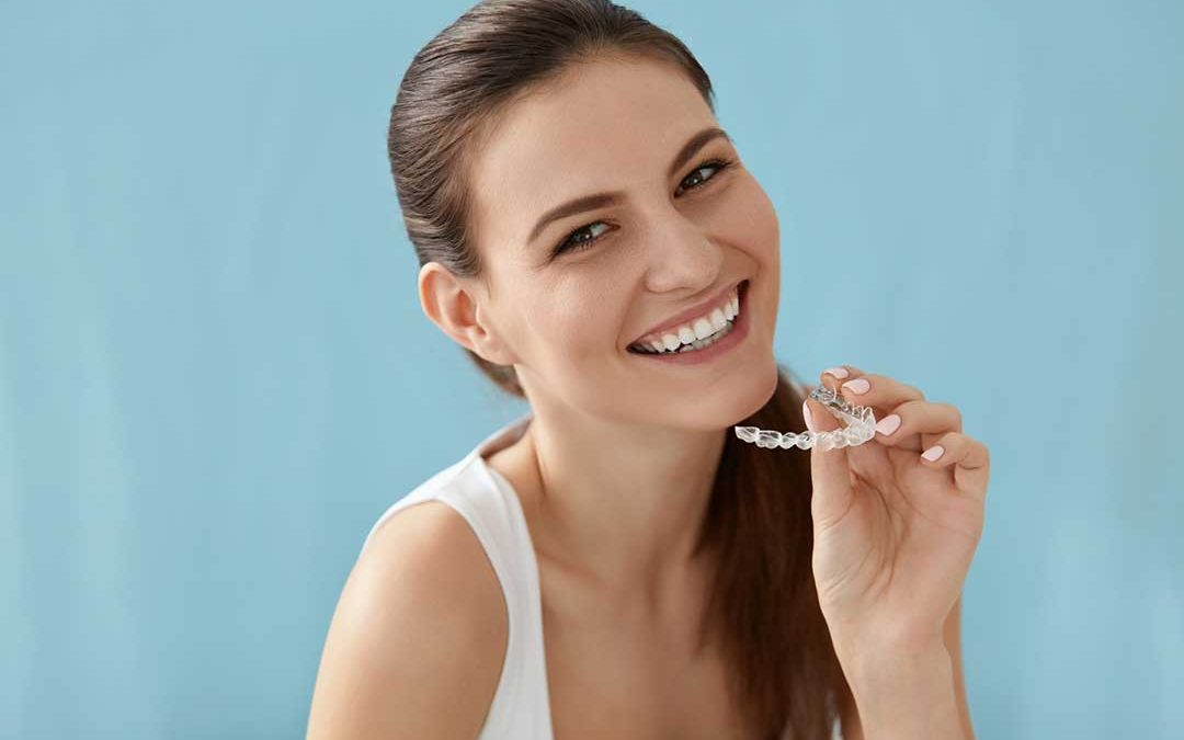 young woman clear retainers boca raton